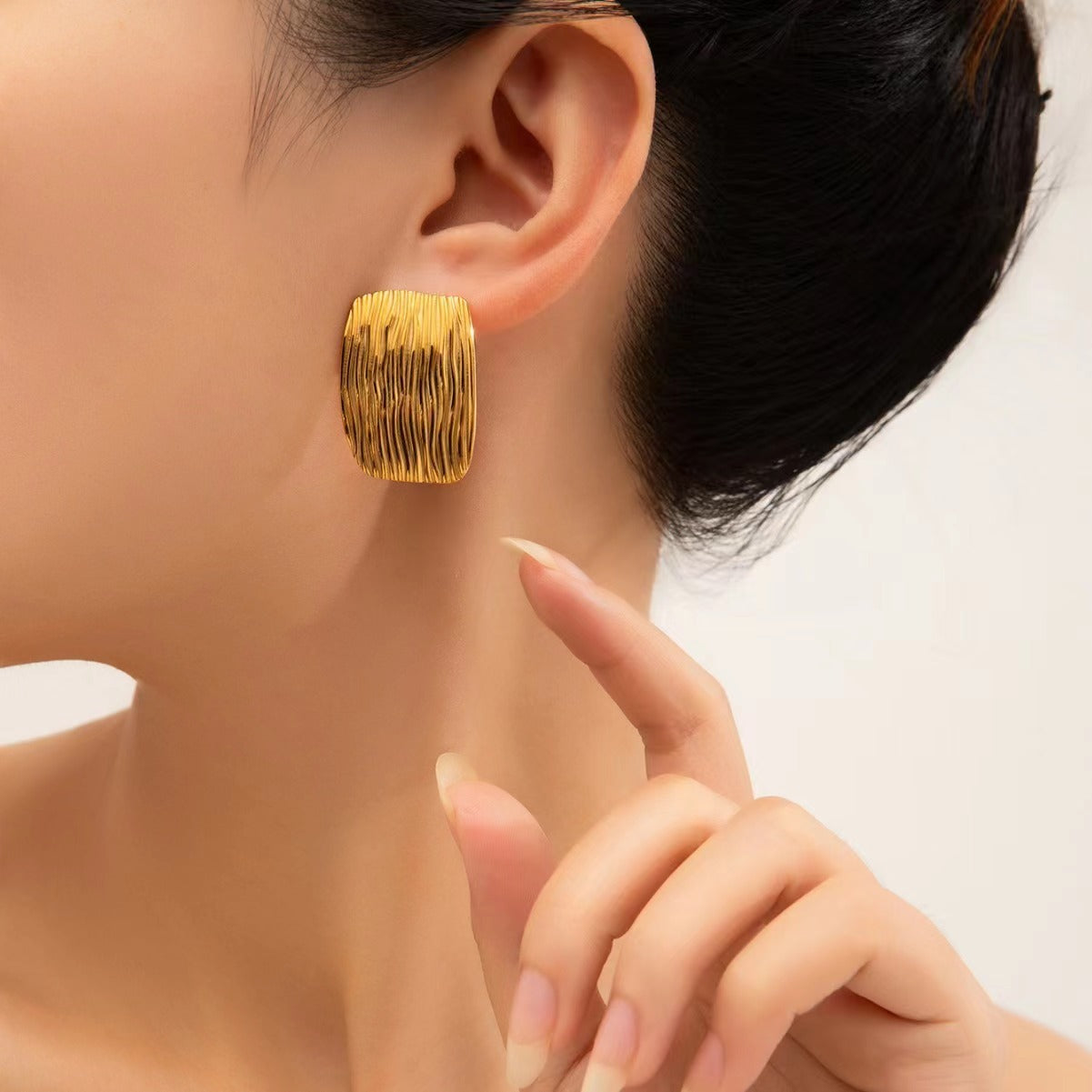 قرط ذو منصة